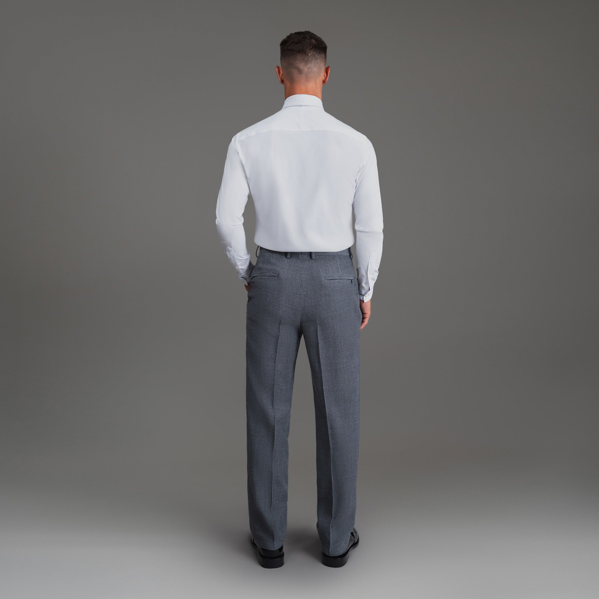 Bespoke custom athleisure technical athletic stretch suit los angeles model Tyler in Silver