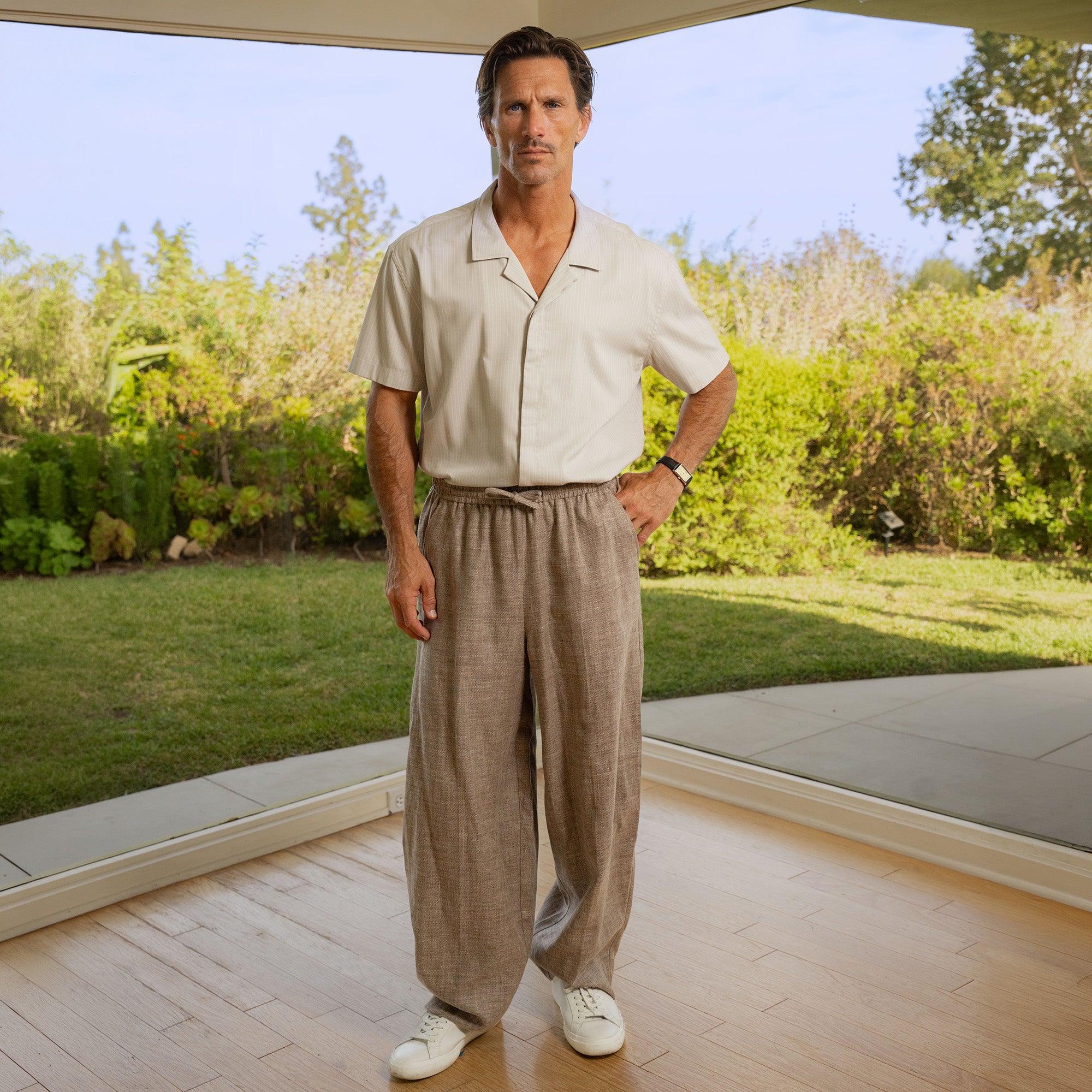 Drawstring Wide Leg Pant model tyler in Dark Brown