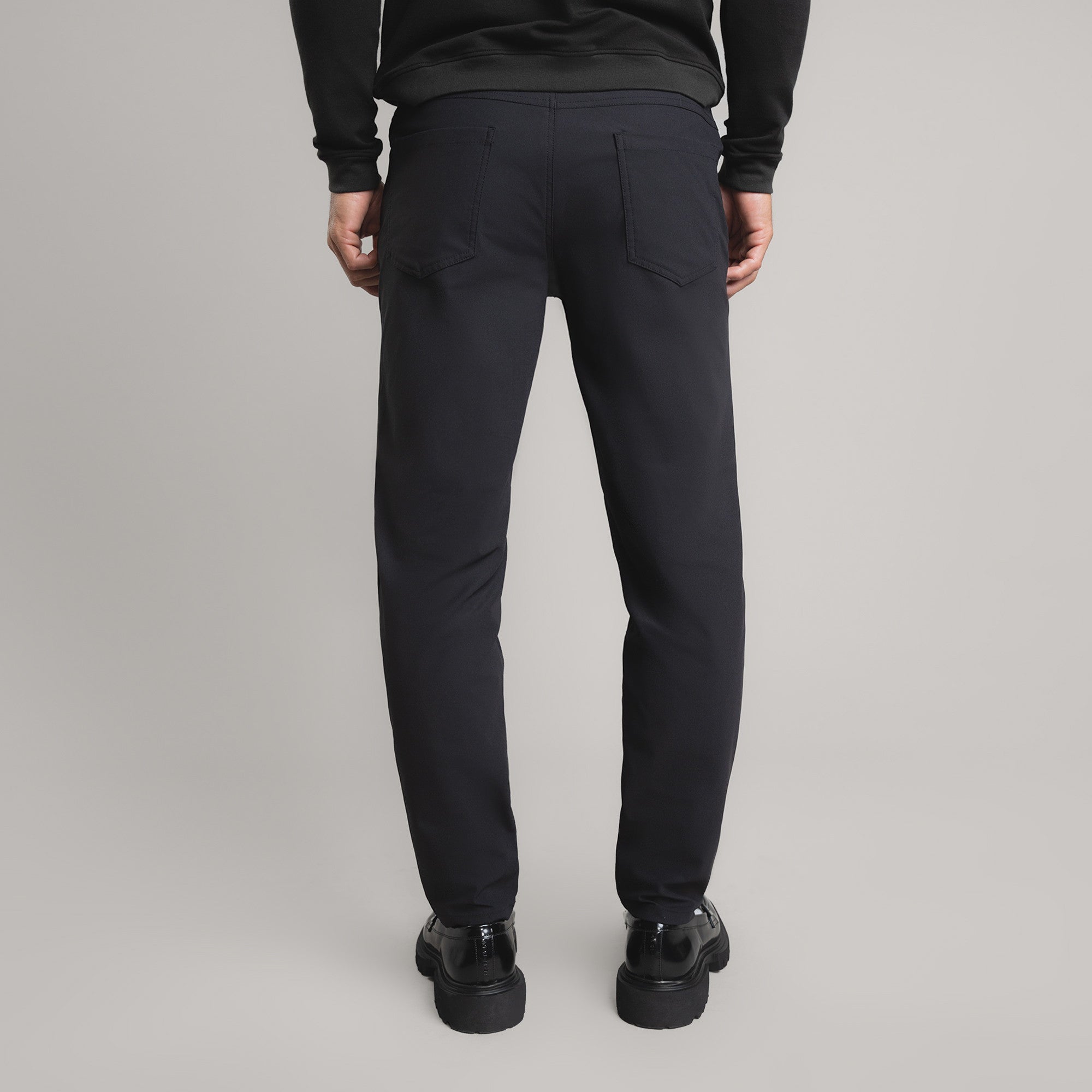 custom tech performance stretch pants model Tyler in Black