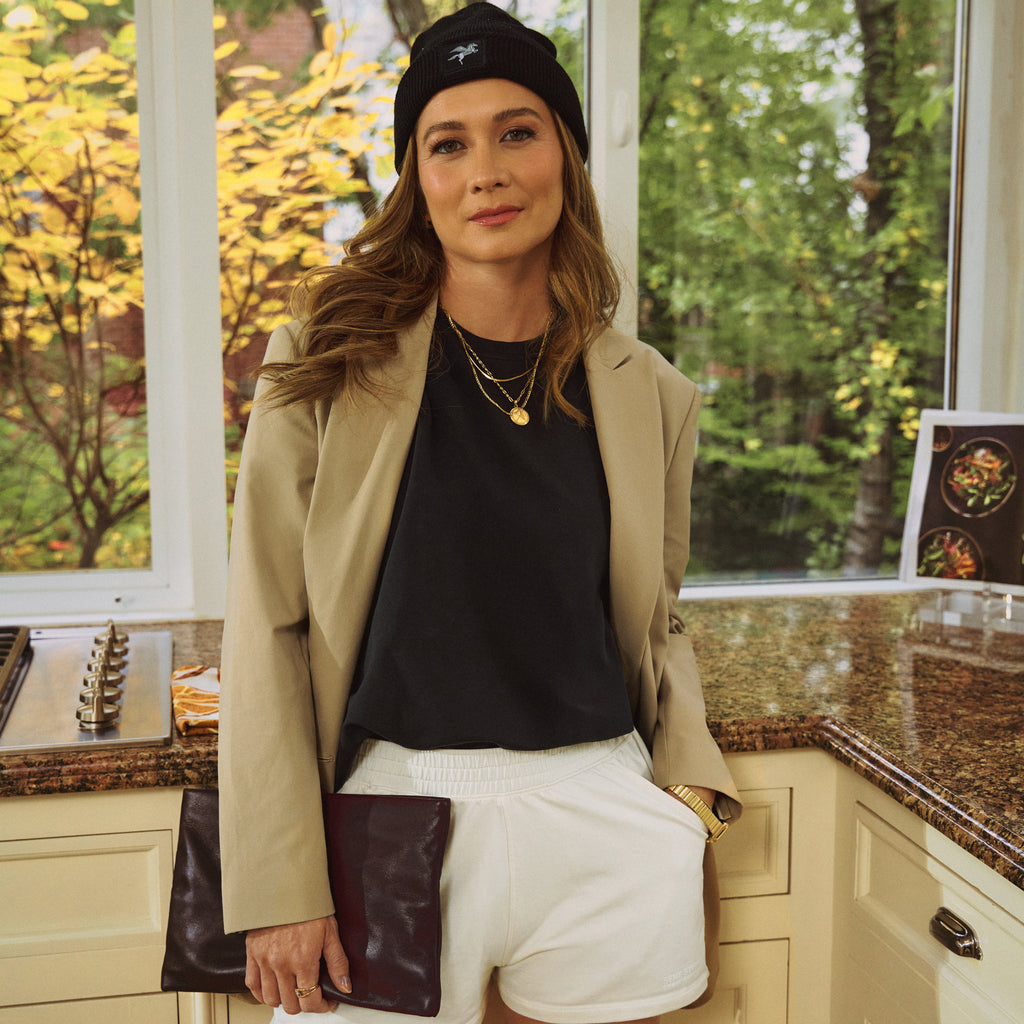 emma lovewell x sene peloton instructor model emma wearing flextech blazer in sand