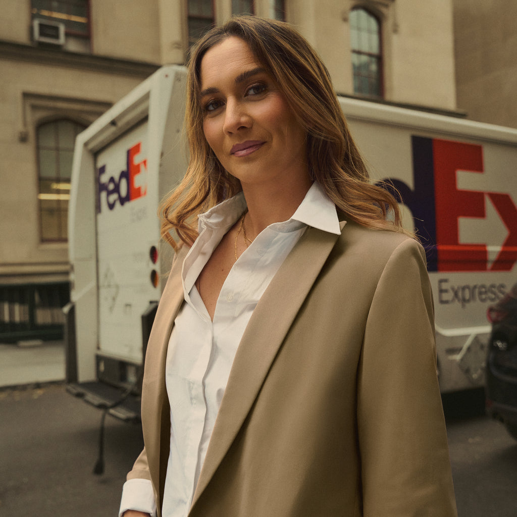 emma lovewell x sene peloton instructor model emma wearing flextech blazer in sand