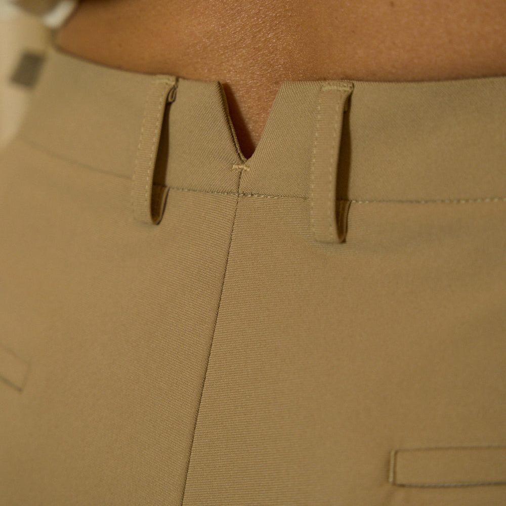 emma lovewell x sene peloton instructor model emma wearing flextech trouser in sand