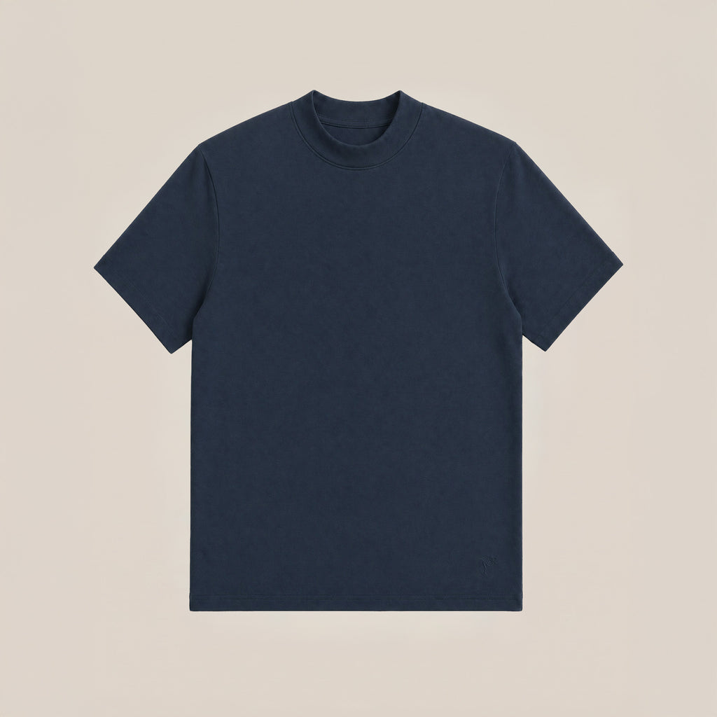 Deep Sea short-sleeve shirt flatlay against a beige background model Kive in Deep Sea