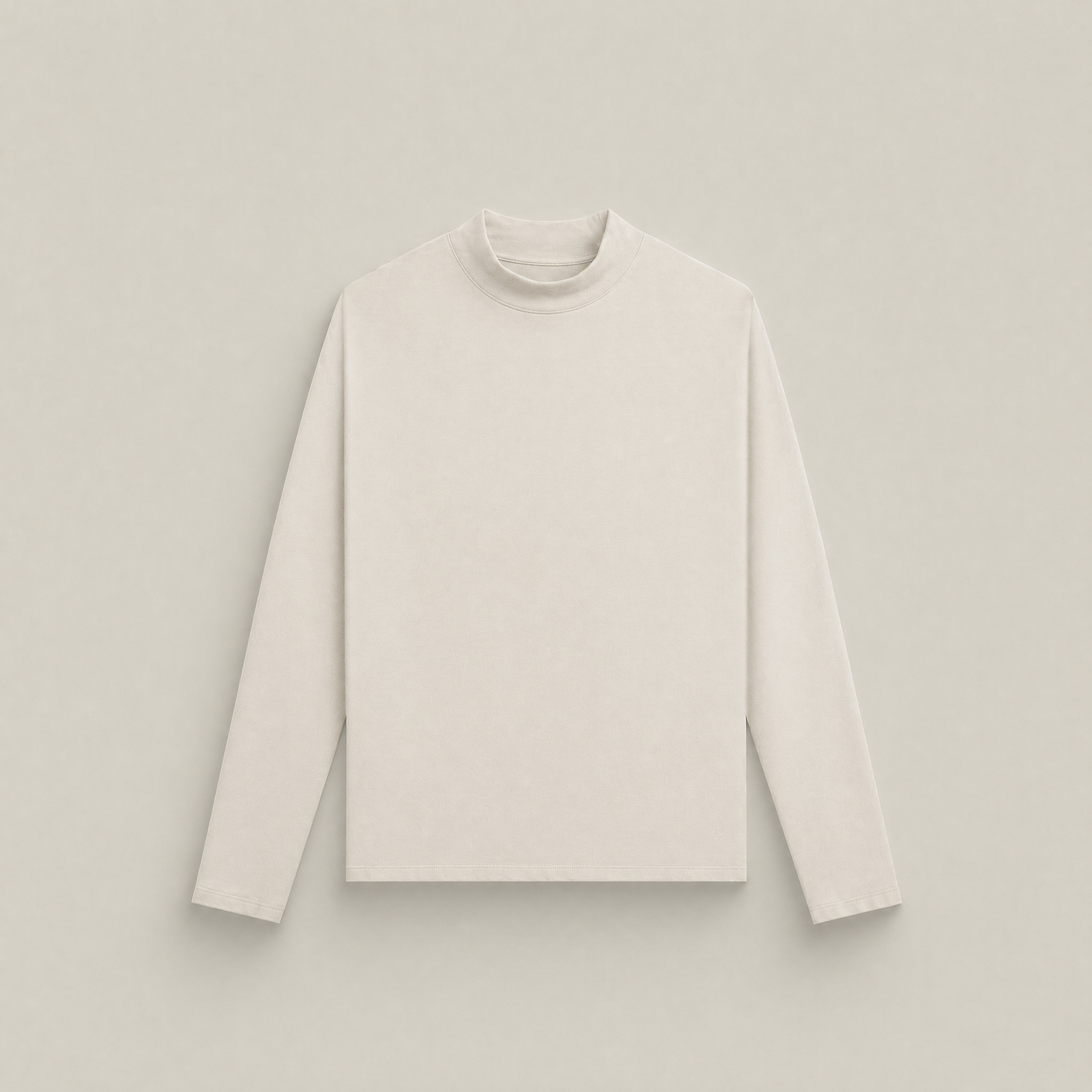 Bone long-sleeve shirt flatlay against a beige background model Kive in Bone