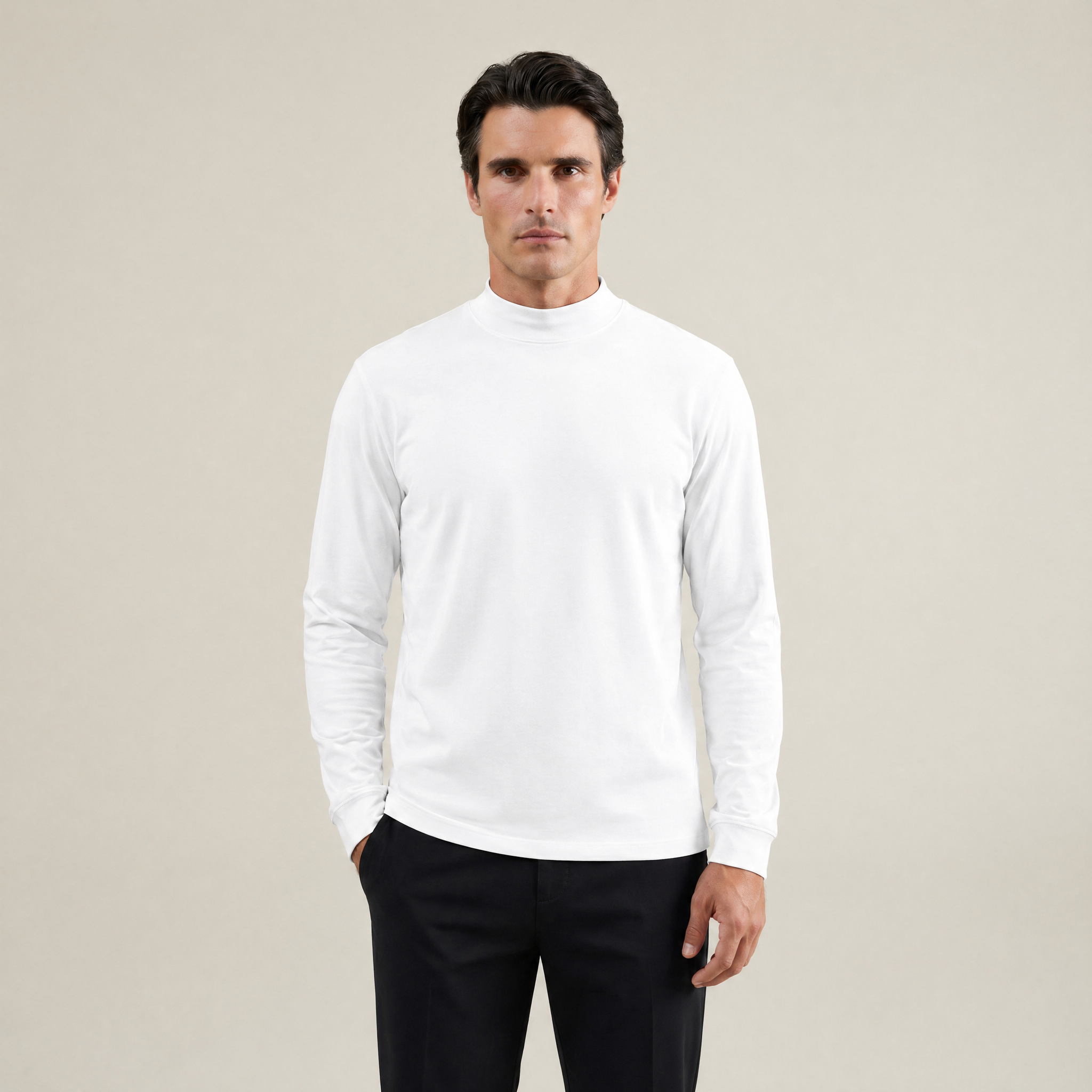Man wearing a white long-sleeve shirt against a beige background model Kive in white