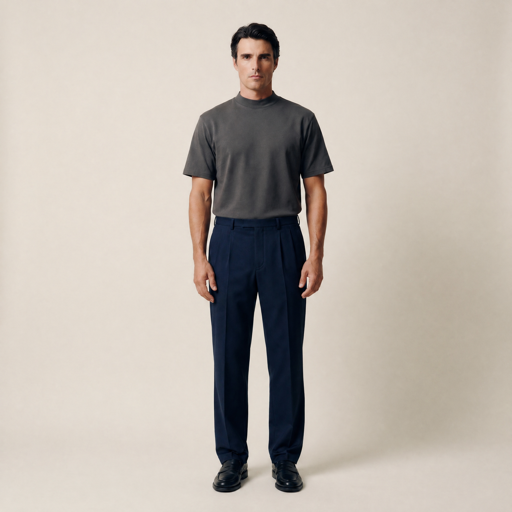 Man wearing a smoke short-sleeve shirt against a beige background model Kive in smoke