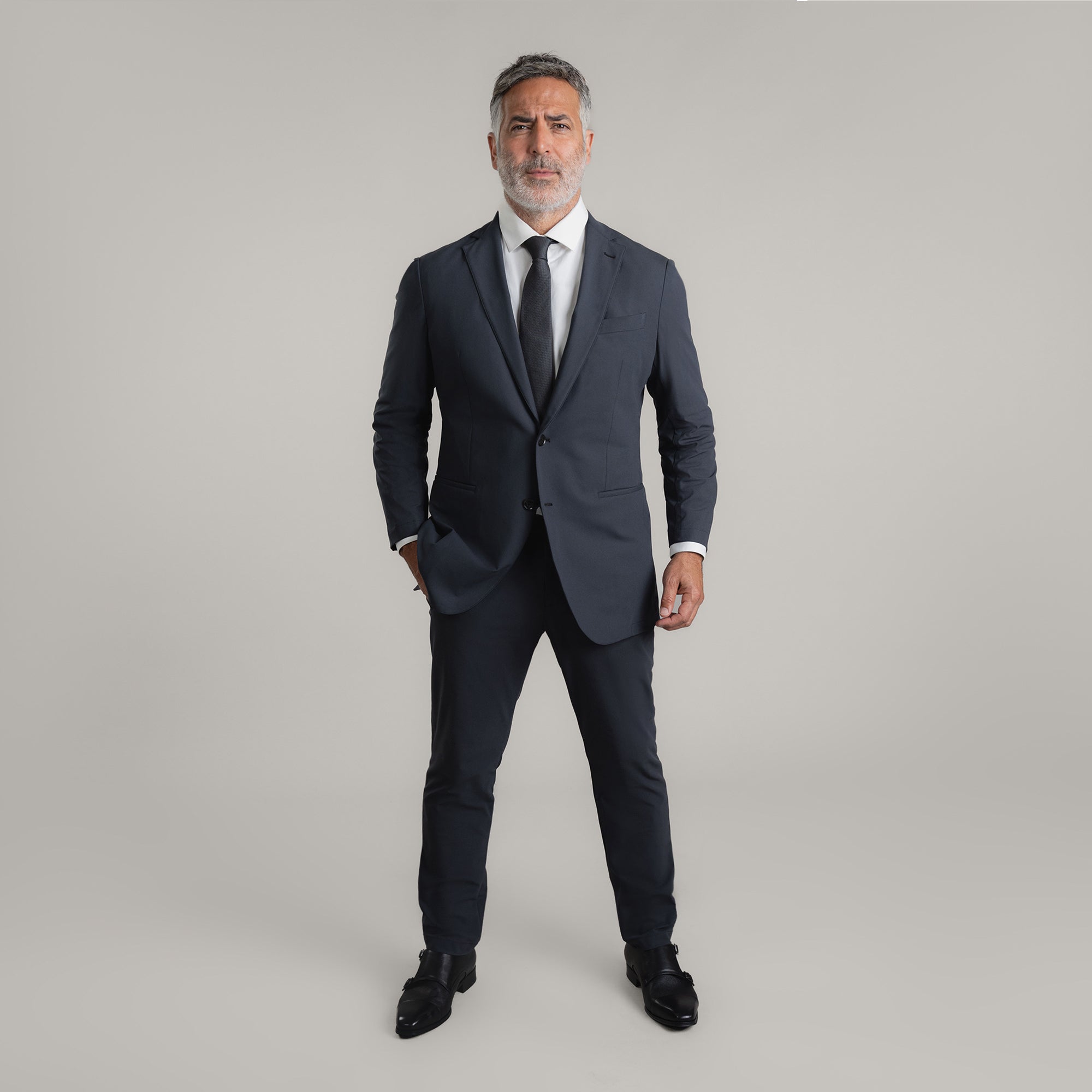 Tags:(5'11"|176 lbs) Bespoke custom athleisure technical men's suit los angeles model Guillermo in Charcoal