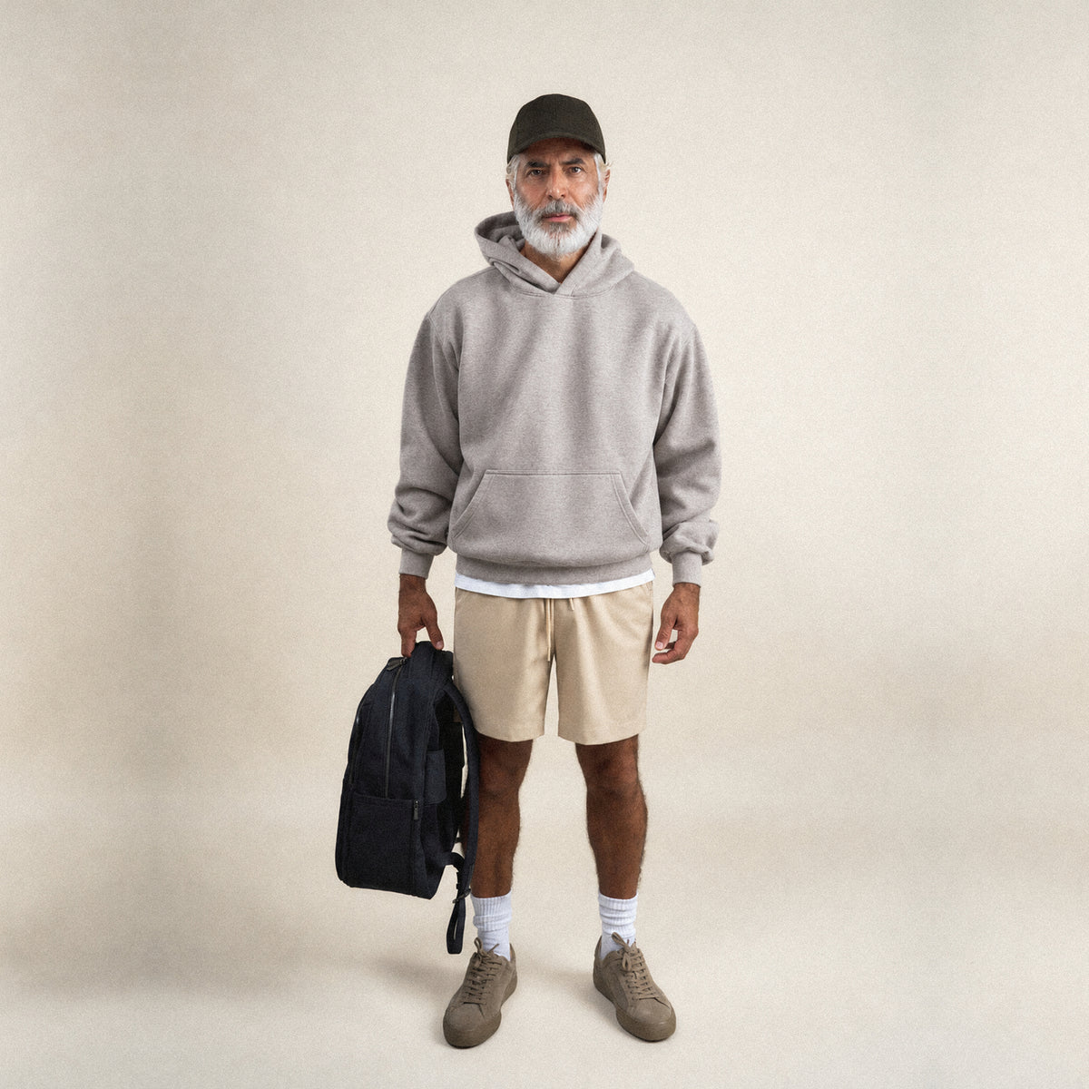 Heavyweight Terry Standard Hoodie model Guillermo in Heather Stone