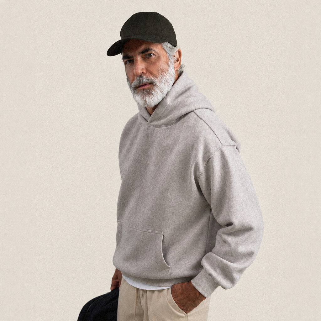Heavyweight Terry Standard Hoodie model Guillermo in Heather Stone