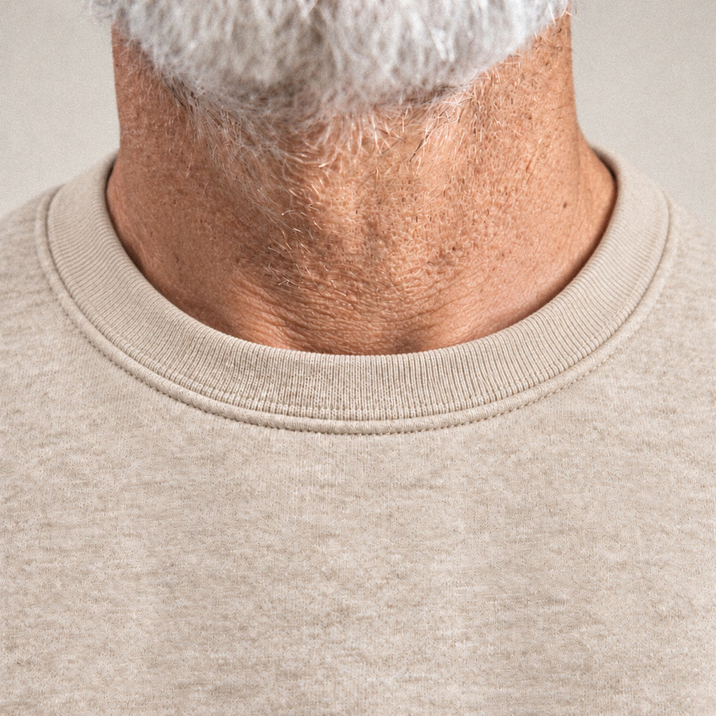 Evening Crewneck Sweater model Guillermo in Heather Sand