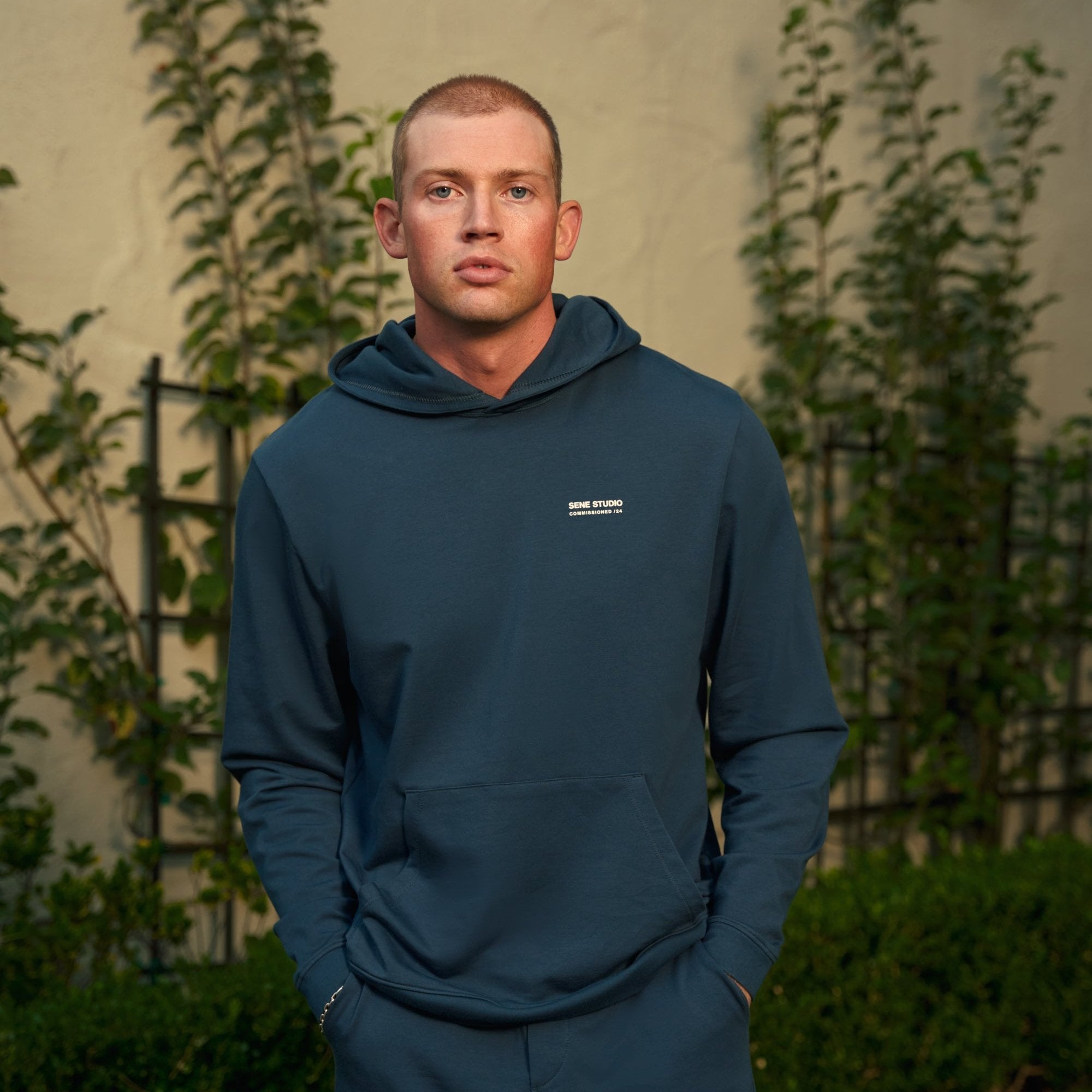 men's custom hoodie model Tyler in Deep Sea