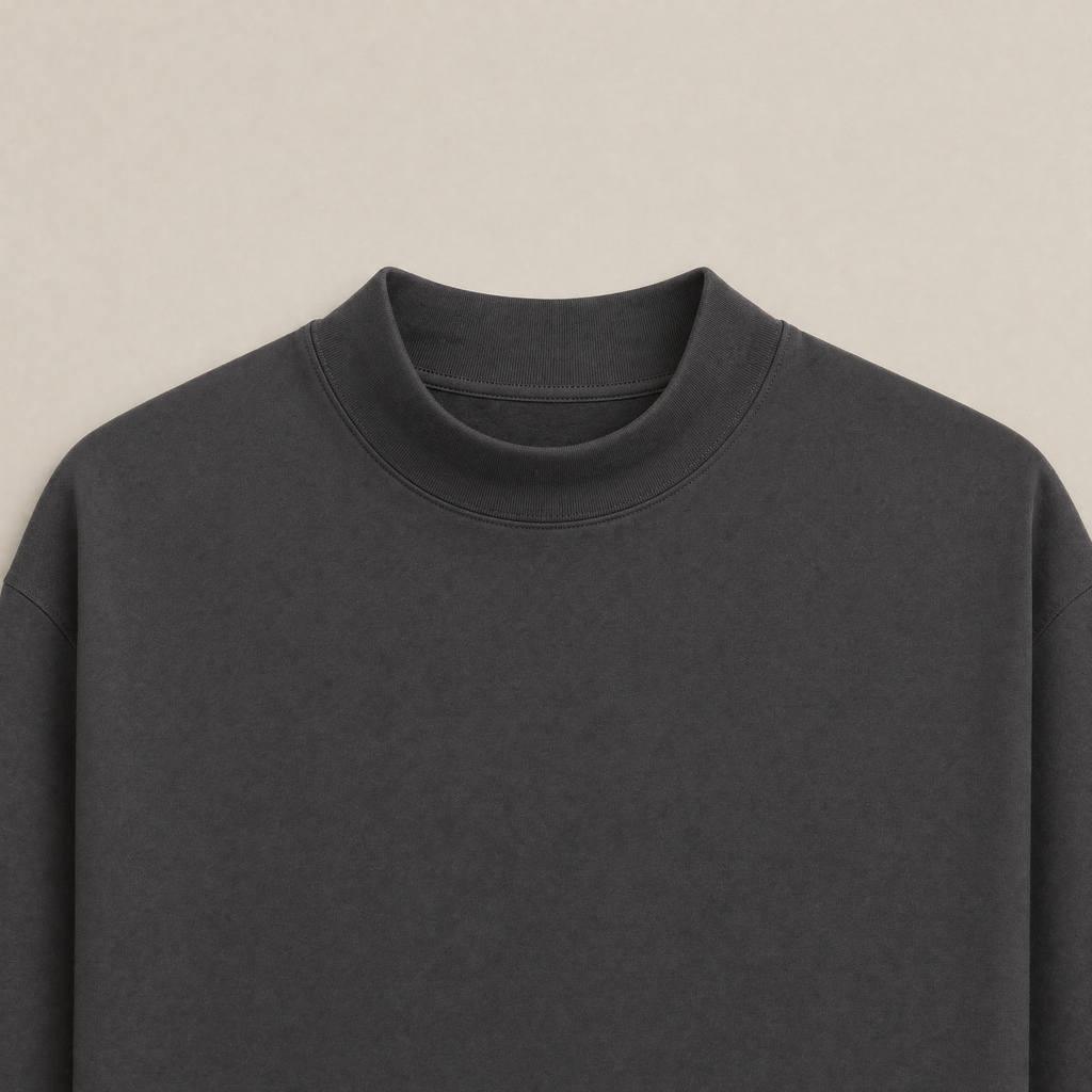 Close up of Smoke long-sleeve shirt flatlay against a beige background model Kive in Smoke