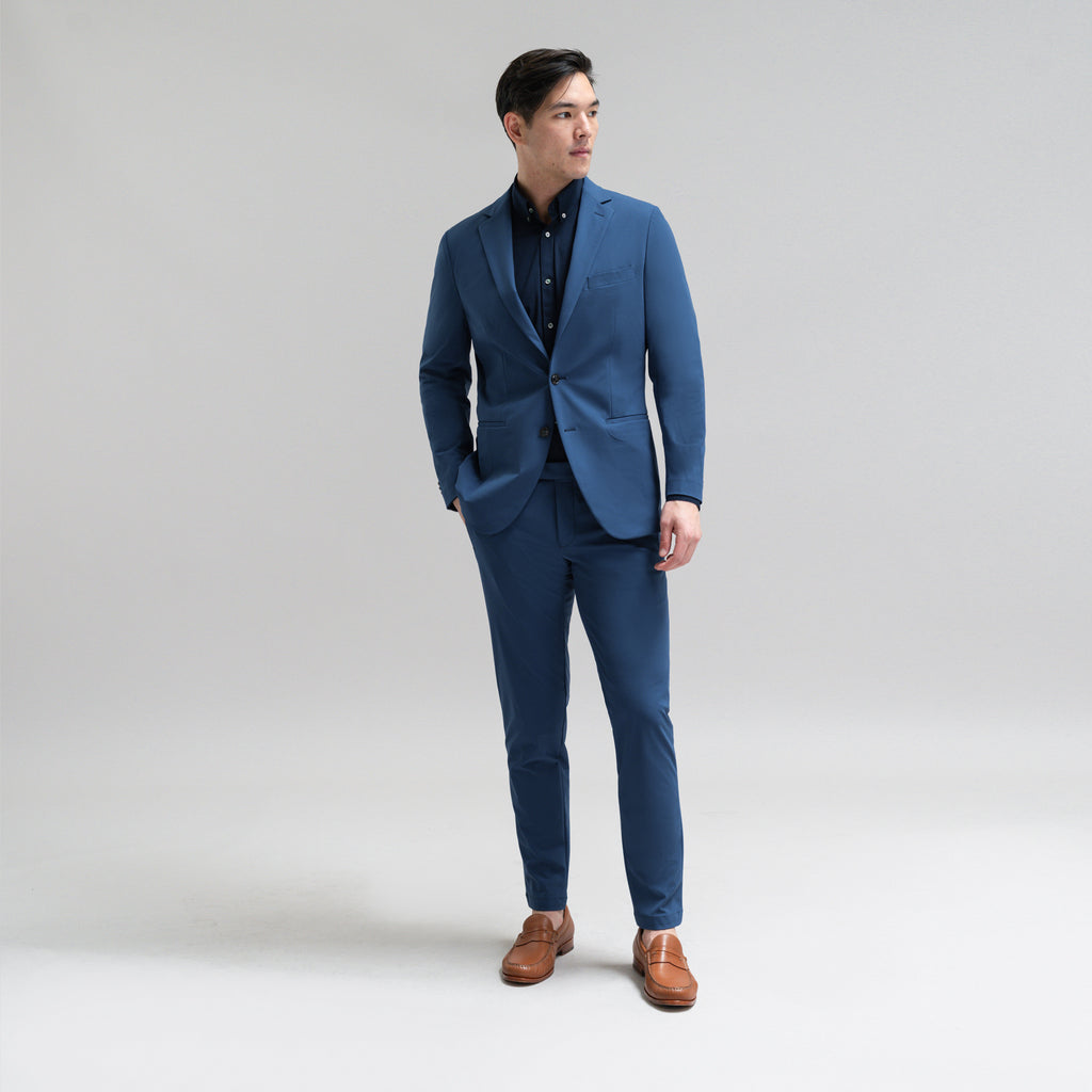 Bespoke custom athleisure technical athletic stretch suit los angeles model Jesse in Italian Blue