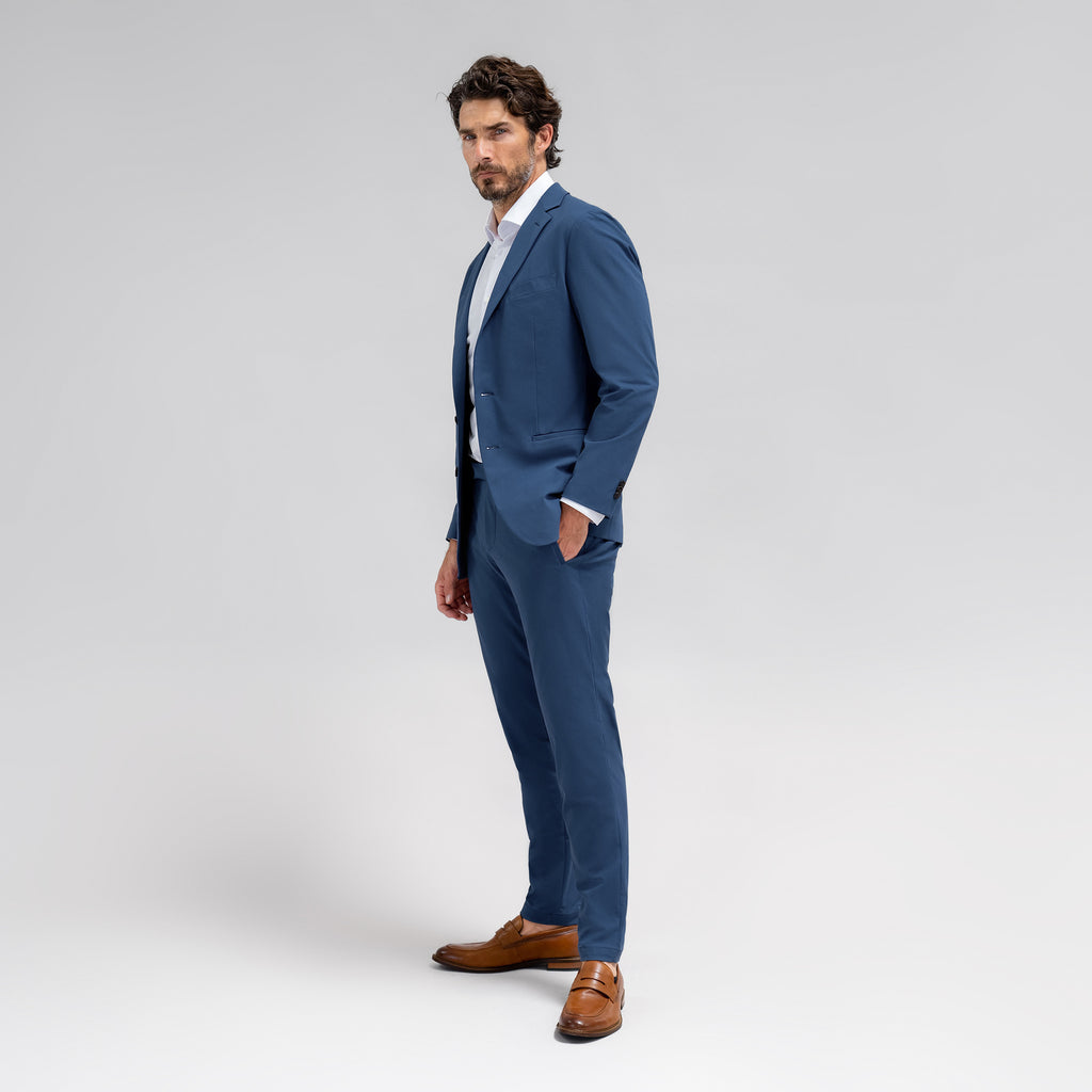Bespoke custom athleisure technical athletic stretch suit los angeles model John in Italian Blue