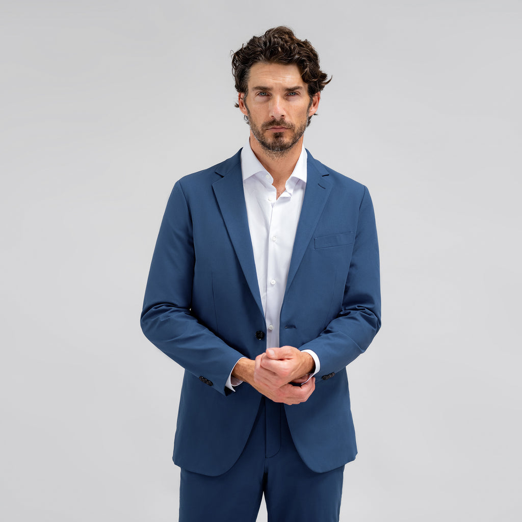 Bespoke custom athleisure technical athletic stretch suit los angeles model John in Italian Blue