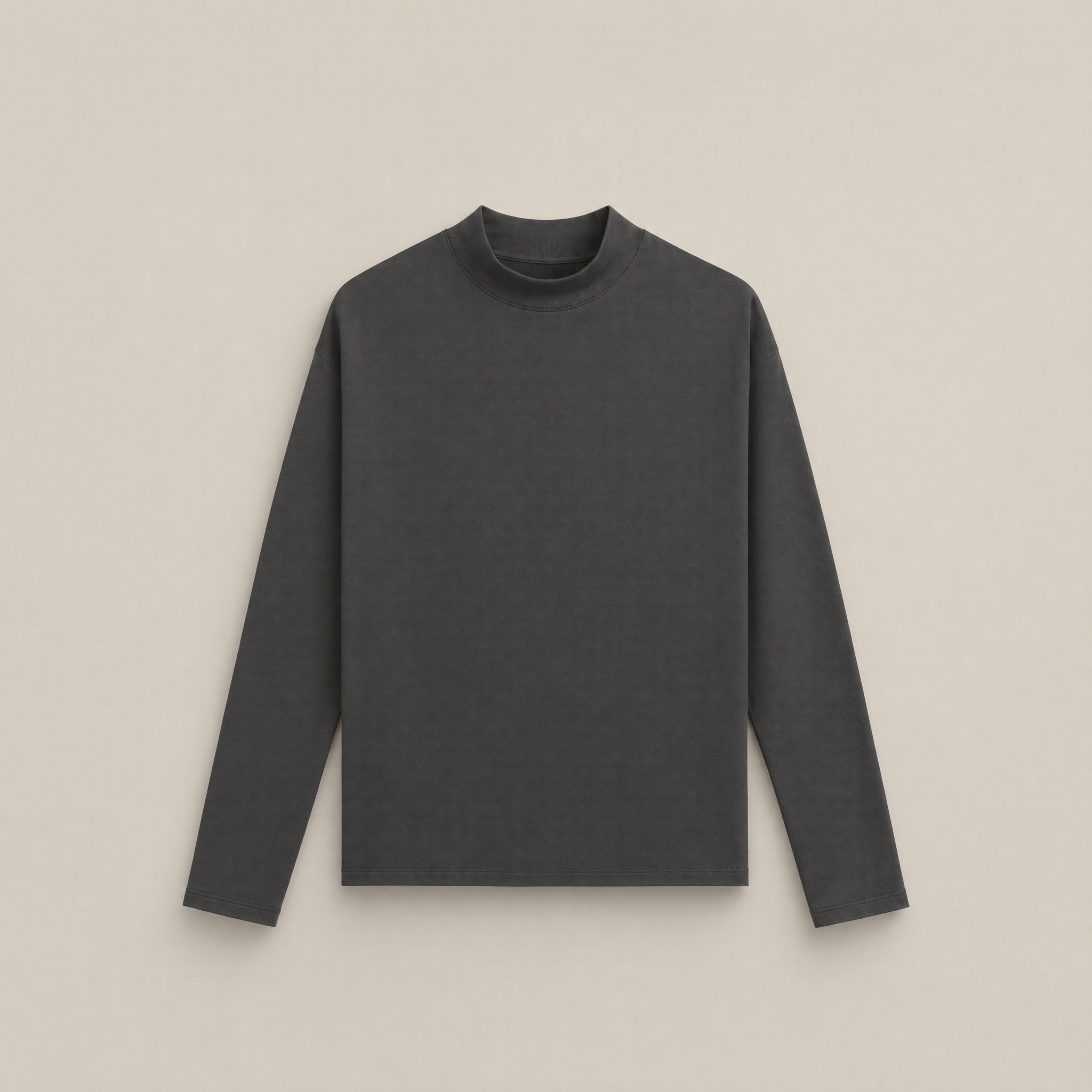 Smoke long-sleeve shirt flatlay against a beige background model Kive in Smoke