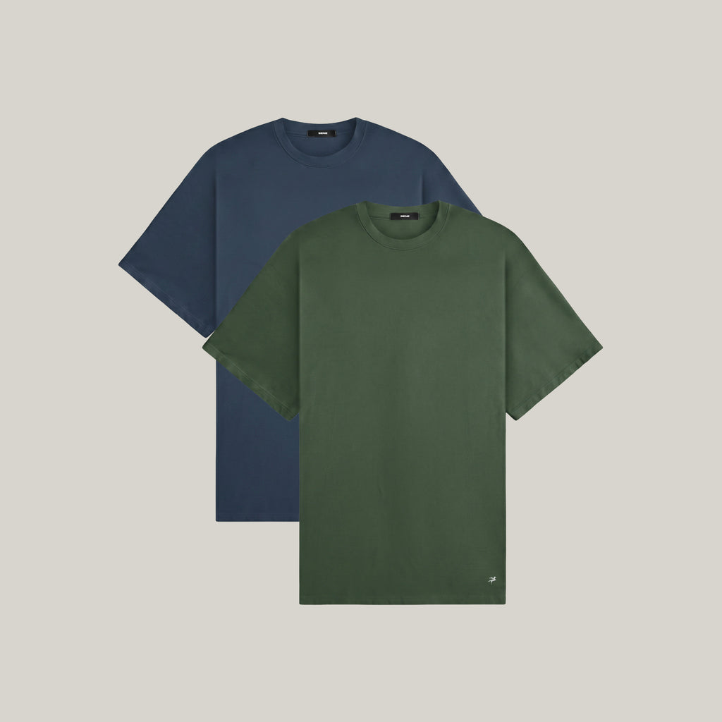 Two oversized t-shirts in deep sea and moss on a beige background model Kive in Coast