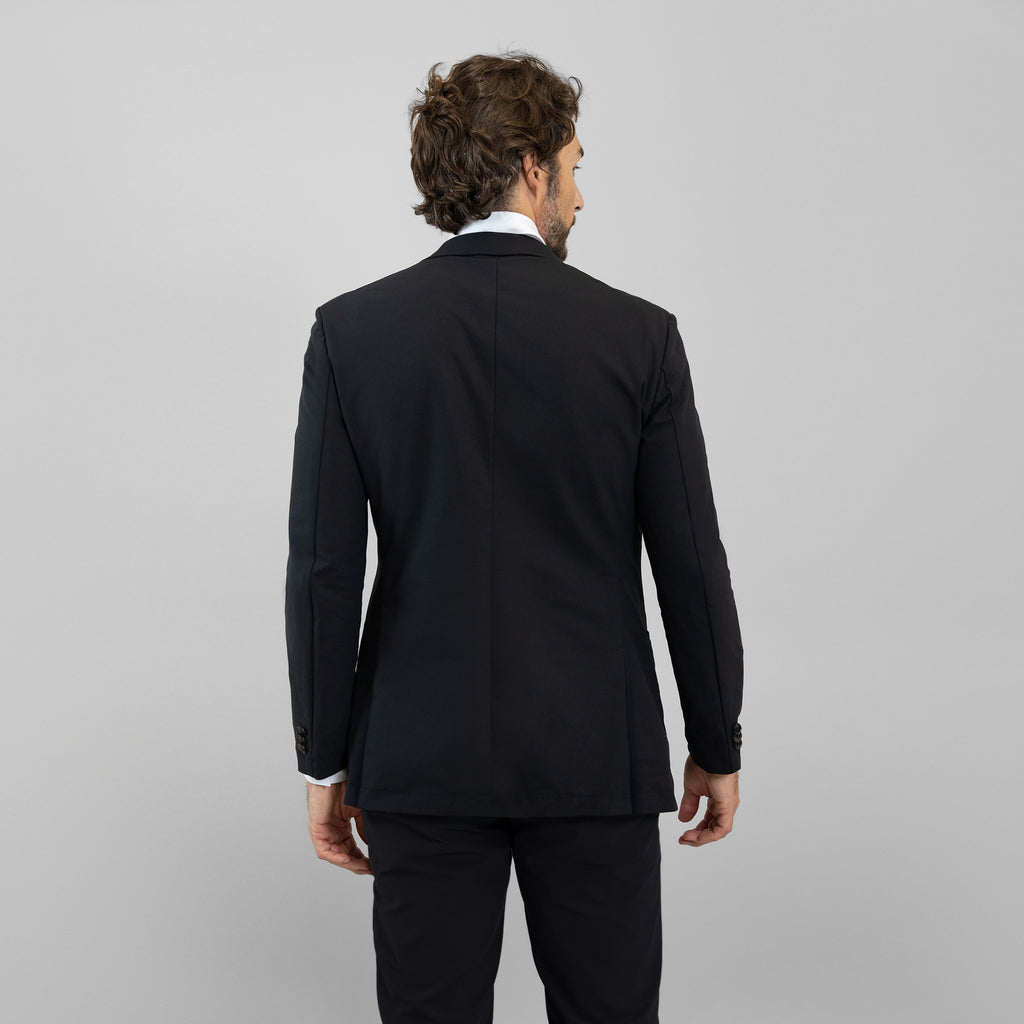 Bespoke custom athleisure technical athletic stretch suit los angeles model John in Black
