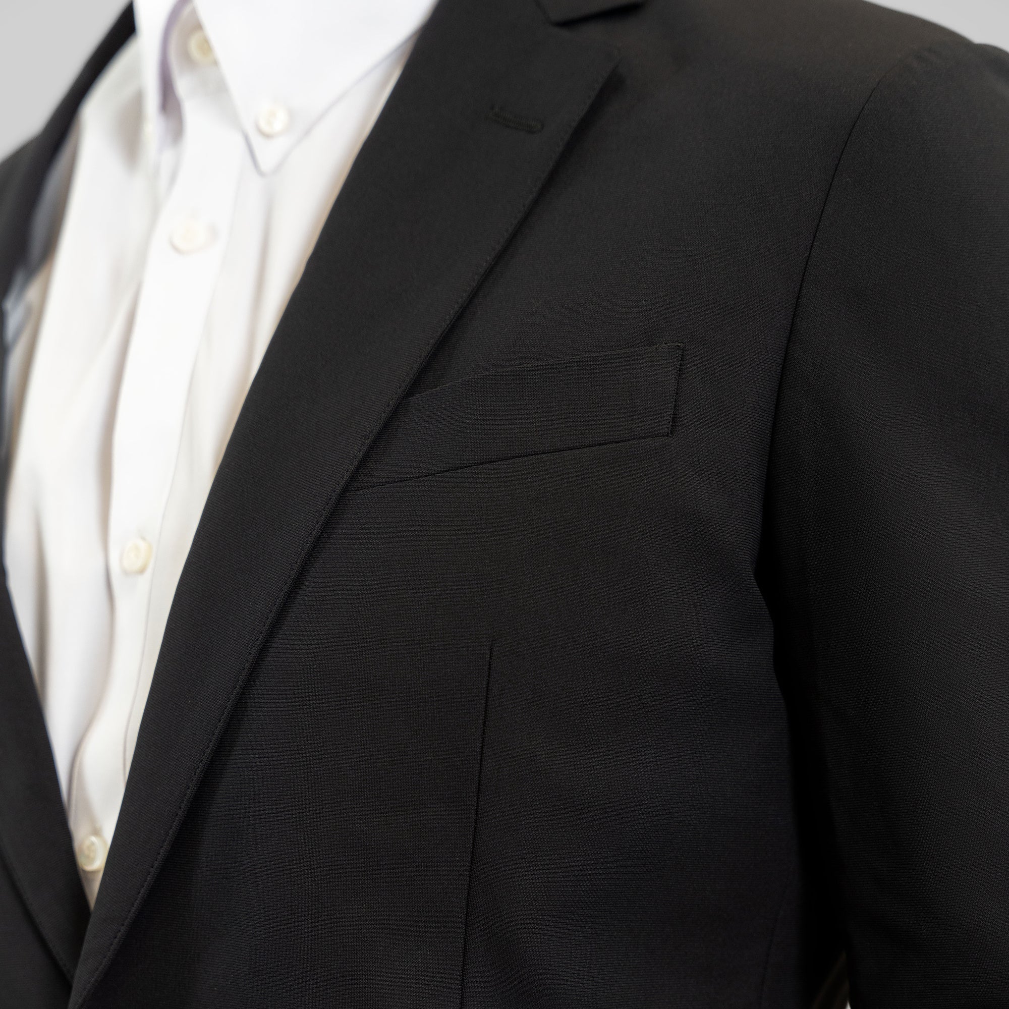 Bespoke custom athleisure technical athletic stretch suit los angeles model John in Black