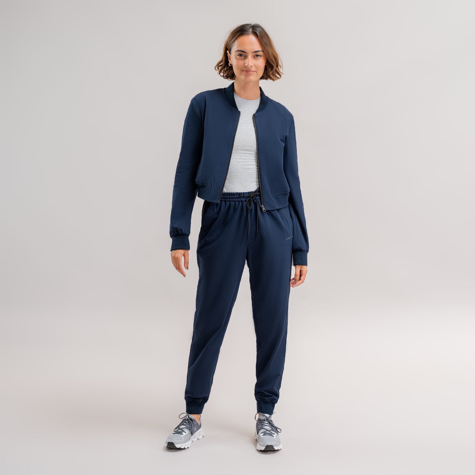 womens custom flextech bomber jacket plus size model Moe in Navy