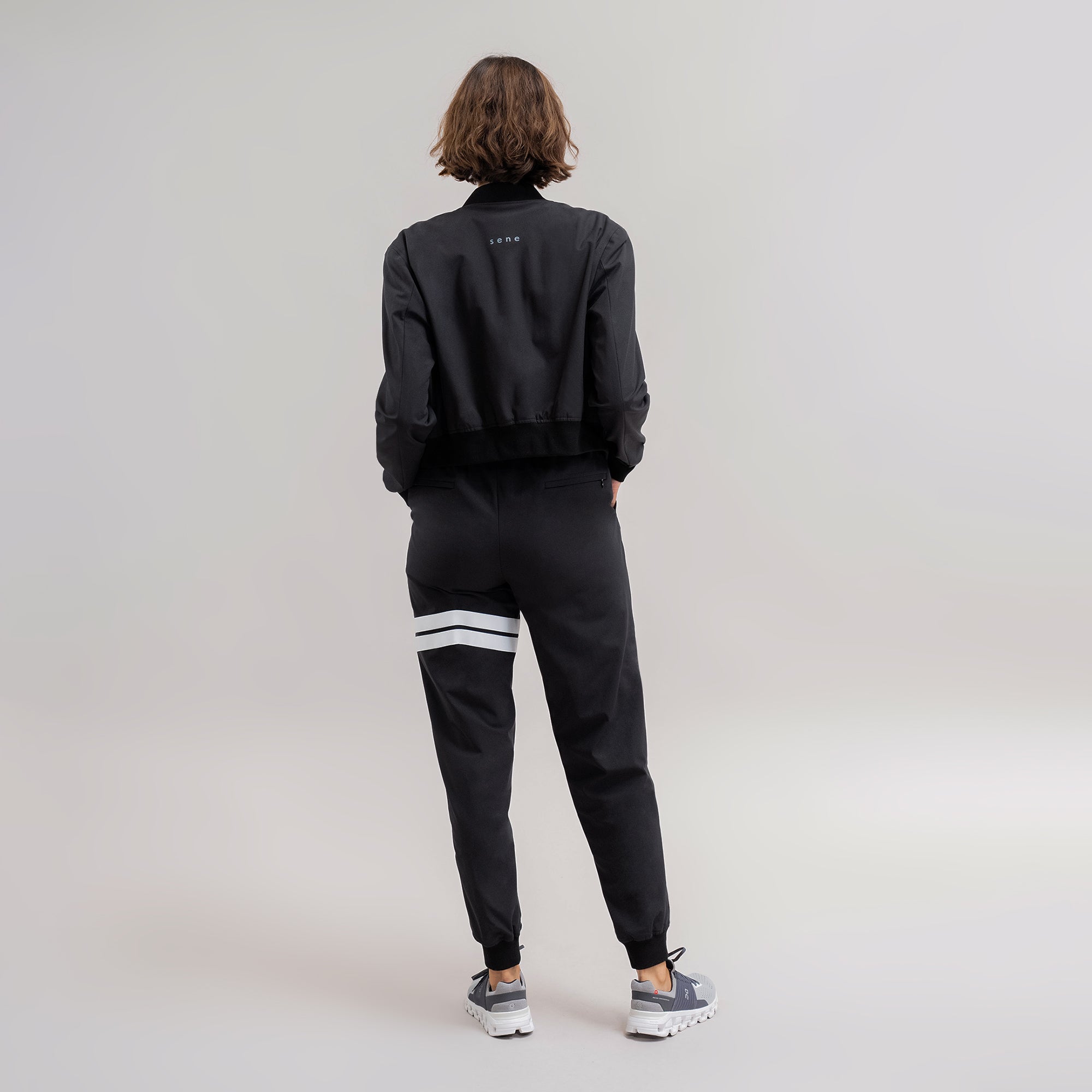 womens custom flextech bomber jacket plus size model Moe in Black