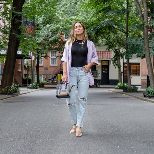 Peloton instructor Emma Lovewell mom jeans model emma in emma blue